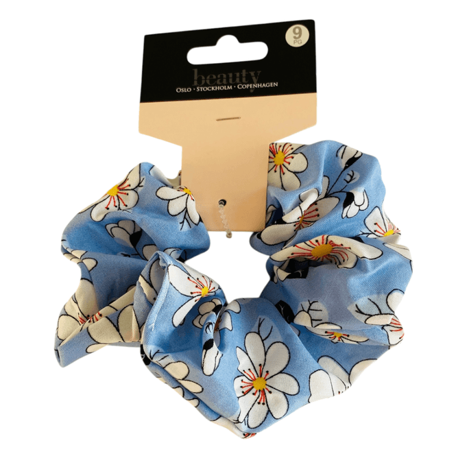 Hovedbilde Hårstrikk blå med blomster